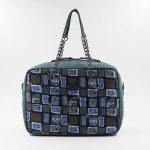 Bag in silk and oil green leather