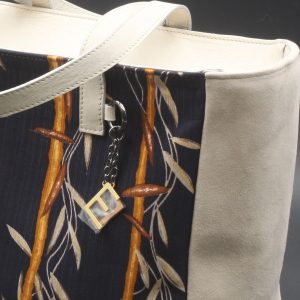 Bag stylized in suede beige and blue