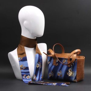 Borsa a spalla in vera pelle marrone e seta con stampa floreale