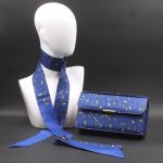 Kit Cloutch pochette con stampa floreale stilizzata